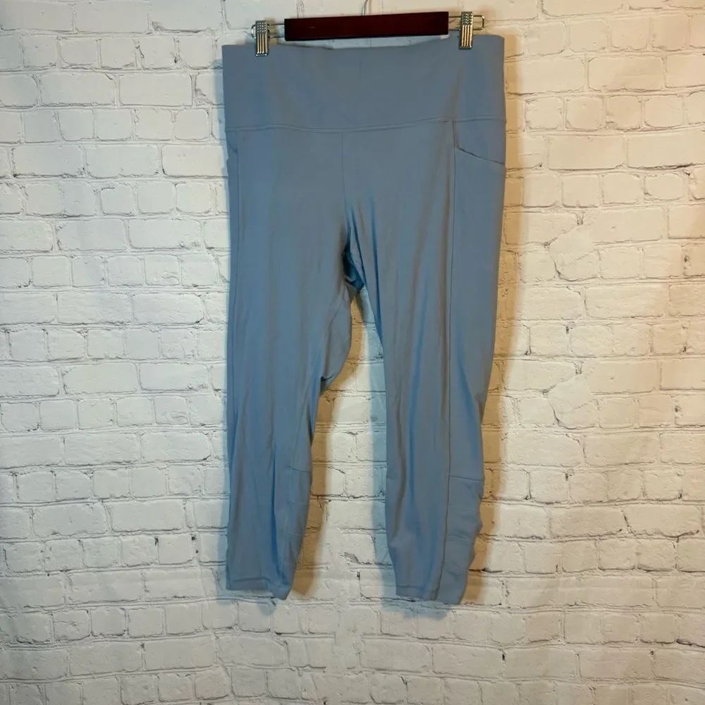 Athleta Salutation Stash Pocket II Cinch 7/8 Tight Leggings size XL